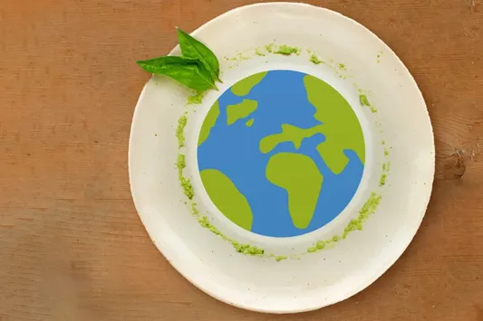 Eine Abbildung des Planeten Erde auf einem Ess-Teller